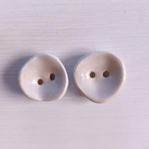 2 botones 2.5cm Gris claro