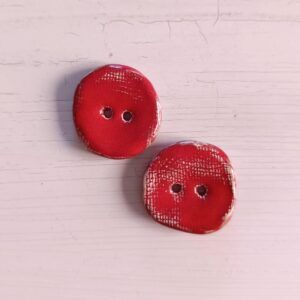 2 botones 3cm con textura Rojos